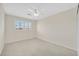 Bedroom features carpet flooring, a ceiling fan, and one window at 928 Aspen Valley Ave, Las Vegas, NV 89123