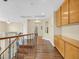 Hallway featuring wood floors, built-in cabinets, and decorative wall niches at 928 Aspen Valley Ave, Las Vegas, NV 89123