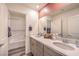 Bathroom featuring double sinks, a large mirror, modern fixtures, and a shower-tub combo at 1007 Gentle Swan St # Lot 699, Henderson, NV 89011