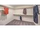 Spacious walk-in closet with ample storage and neutral carpeting at 1007 Gentle Swan St # Lot 699, Henderson, NV 89011