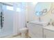 Contemporary bathroom with sleek vanity and shower at 10744 Balsam Creek Ave, Las Vegas, NV 89144