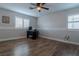 Bedroom with hardwood floors and a ceiling fan at 10744 Balsam Creek Ave, Las Vegas, NV 89144