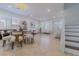 Spacious living area flows into the dining space, offering great natural light and stylish decor at 10744 Balsam Creek Ave, Las Vegas, NV 89144