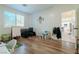 Playroom with hardwood floors, natural light, and space for activities at 10744 Balsam Creek Ave, Las Vegas, NV 89144