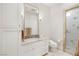 Well-lit bathroom with modern fixtures, a vanity, and a walk-in shower at 11 Misty Peaks Ct, Las Vegas, NV 89135