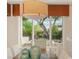 Dining area with views of a landscaped backyard at 11 Misty Peaks Ct, Las Vegas, NV 89135