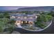 Expansive multi-story home boasts mature landscaping, a tile roof and mountain views at 11 Misty Peaks Ct, Las Vegas, NV 89135