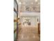 Grand foyer with a soaring ceiling, gleaming floors, and an open floor plan to the living area at 11 Misty Peaks Ct, Las Vegas, NV 89135