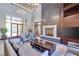 Inviting lobby area with comfortable seating and a cozy fireplace feature at 11 Misty Peaks Ct, Las Vegas, NV 89135