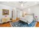 Cozy main bedroom with a comfortable bed, stylish rug, and classic furnishings at 11 Misty Peaks Ct, Las Vegas, NV 89135