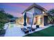 Beautiful backyard with a pool, lounge chairs, and an outdoor dining area, perfect for relaxation at 11 Misty Peaks Ct, Las Vegas, NV 89135