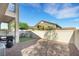 Fenced backyard with patio, outdoor dining and BBQ at 1101 Elation Ln # 2, Henderson, NV 89002