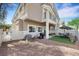 Gravel backyard with patio, outdoor dining set, and BBQ grill at 1101 Elation Ln # 2, Henderson, NV 89002