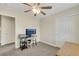 Bedroom with a ceiling fan, desk space, and ample storage at 1101 Elation Ln # 2, Henderson, NV 89002