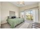 Spacious bedroom with a sliding door to outdoor balcony at 1101 Elation Ln # 2, Henderson, NV 89002