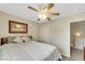 Cozy bedroom featuring neutral tones, ceiling fan, and convenient closet space at 1101 Elation Ln # 2, Henderson, NV 89002