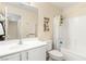 Bright bathroom featuring a shower-tub combination and a single sink vanity with a large mirror at 11226 Kenyan Sunshine Ct, Las Vegas, NV 89138