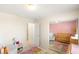 Bedroom featuring stars on the walls, closet doors, and bright colored rug at 11226 Kenyan Sunshine Ct, Las Vegas, NV 89138
