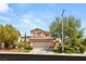 Charming two-story home with landscaped yard and a two-car garage in a well-maintained neighborhood at 11226 Kenyan Sunshine Ct, Las Vegas, NV 89138