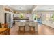 Spacious kitchen with modern appliances, sleek countertops, and easy access to the outdoor living and pool at 11226 Kenyan Sunshine Ct, Las Vegas, NV 89138