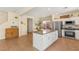 Bright, open kitchen featuring granite countertops, stainless steel appliances, and ample cabinet space at 11226 Kenyan Sunshine Ct, Las Vegas, NV 89138