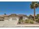 Charming single-story home featuring desert landscaping, a two-car garage, and a classic tile roof at 1128 Galangate Ave, Henderson, NV 89015