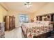 Main bedroom with an exterior door, wood floors, a ceiling fan, and spacious layout at 1128 Galangate Ave, Henderson, NV 89015