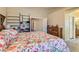 Comfortable main bedroom featuring wood floors, spacious layout and natural light at 1128 Galangate Ave, Henderson, NV 89015