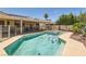 The pool and spa create a backyard oasis, complemented by desert landscaping at 1128 Galangate Ave, Henderson, NV 89015