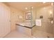 Large tub and walk-in shower are showcased in this well-appointed bathroom at 145 E Harmon Ave # 919, Las Vegas, NV 89109