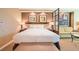 Well-appointed bedroom featuring comfortable bedding, artwork, and a cozy sitting area at 145 E Harmon Ave # 919, Las Vegas, NV 89109