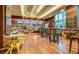 Cafe area featuring modern seating, wood floors, and an inviting atmosphere for residents at 145 E Harmon Ave # 919, Las Vegas, NV 89109