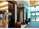 Welcoming entrance with decorative planters and clear access to dining areas at 145 E Harmon Ave # 919, Las Vegas, NV 89109