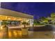 Well lit entrance with decorative plants and tiled driveway at 145 E Harmon Ave # 919, Las Vegas, NV 89109