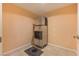 Hallway featuring an ice machine, tile flooring, and a neutral color scheme at 145 E Harmon Ave # 919, Las Vegas, NV 89109