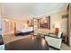 Relaxing hotel room featuring a comfortable bed, sofa, and a partition for added privacy at 145 E Harmon Ave # 919, Las Vegas, NV 89109