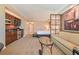 Spacious hotel suite with a kitchenette, sitting area, and a comfortable bed at 145 E Harmon Ave # 919, Las Vegas, NV 89109