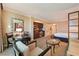 Spacious hotel suite with a kitchenette, sitting area, and a comfortable bed at 145 E Harmon Ave # 919, Las Vegas, NV 89109