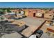 Aerial view of a property with a large dirt lot and surrounding neighborhood at 1847 Stevens St, Las Vegas, NV 89115