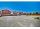 Spacious gravel backyard, enclosed by brick walls, offering potential for custom landscaping at 1847 Stevens St, Las Vegas, NV 89115