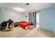 An additional bedroom with carpet, blue walls, and a view of the exterior at 1847 Stevens St, Las Vegas, NV 89115