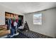 Bedroom featuring patterned carpeting, closet space, and natural light from a window at 1847 Stevens St, Las Vegas, NV 89115
