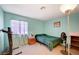 Another bedroom, featuring carpet, showcasing natural light and offering space for exercise equipment at 1847 Stevens St, Las Vegas, NV 89115