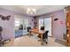Bright dining room with butterfly accents, adjacent to kitchen, offering a welcoming space at 1847 Stevens St, Las Vegas, NV 89115