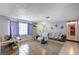 The living room showcases tile flooring, neutral paint, and a window offering natural light at 1847 Stevens St, Las Vegas, NV 89115