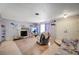 Comfortable living room featuring tile floors, fireplace, and a cozy seating area at 1847 Stevens St, Las Vegas, NV 89115
