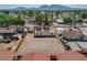 Aerial of house and the open lot, bordered by fences, in its back yard at 1847 Stevens St, Las Vegas, NV 89115