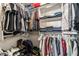 Walk-in closet providing storage with built-in shelving and hanging rods at 200 W Sahara Ave # 3303, Las Vegas, NV 89102