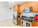 Modern kitchen with stainless steel appliances and sleek, wooden cabinetry at 200 W Sahara Ave # 3303, Las Vegas, NV 89102