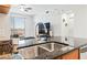 Stylish kitchen island with a granite countertop and stainless steel sink at 200 W Sahara Ave # 3303, Las Vegas, NV 89102